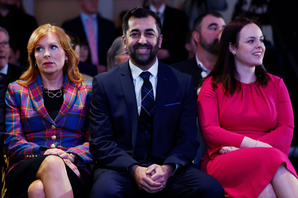 The SNP's new leader Humza Yousaf (centre).