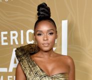 Janelle Monáe wears a gold and black dress at the American Black Film Festival Honors.