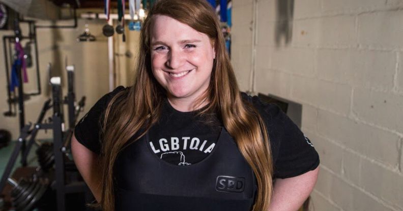 JayCee Cooper in a weight-lifting room
