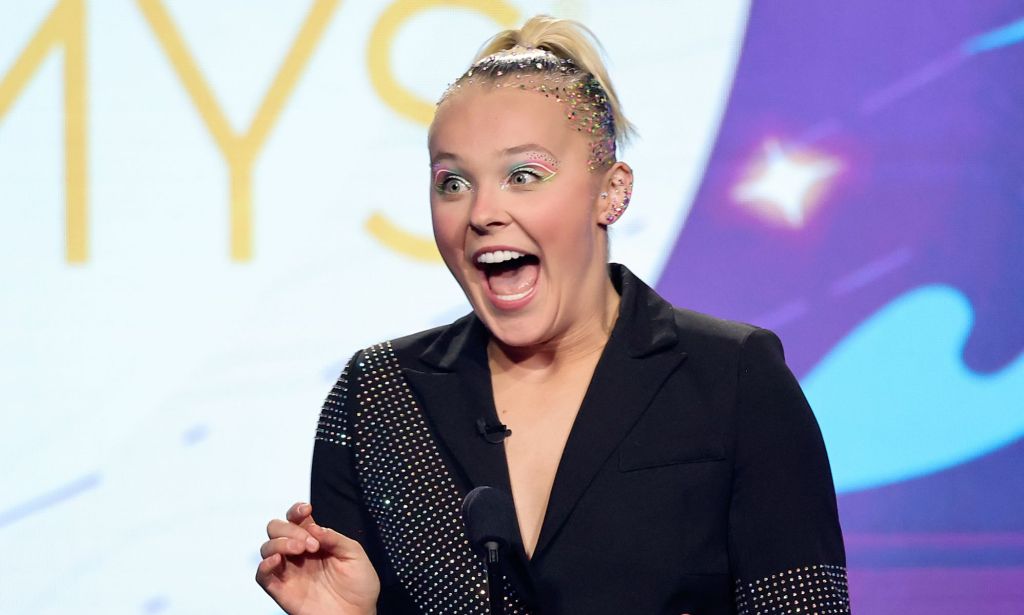 JoJo Siwa onstage during an event.