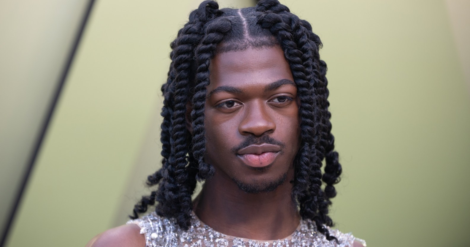 Lil Nas X has caused divide after apologising to the trans community.