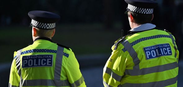 Two Met Police officers stand side-by-side.