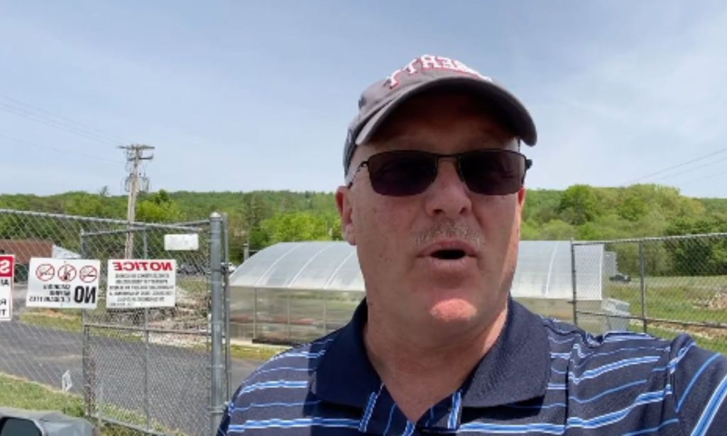 Monty Fritts taking a selfie in a baseball cap and sunglasses.