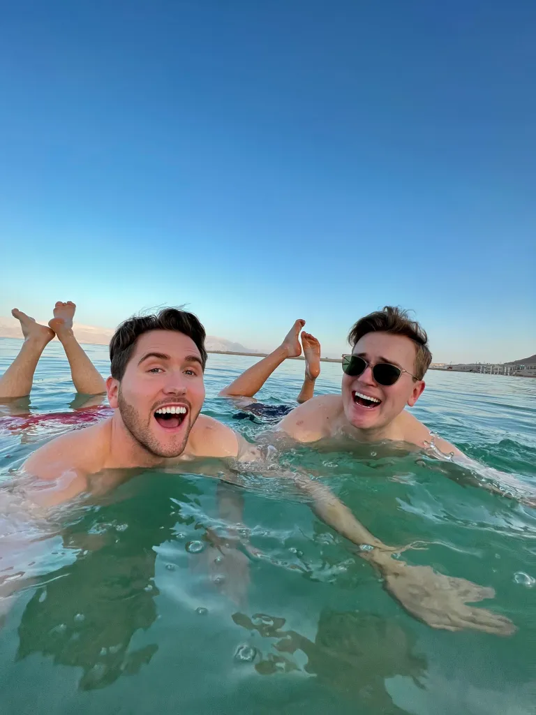Oskar and Dan swimming in the Dead Sea in Israel. 