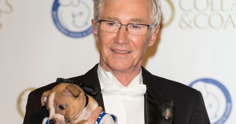 Paul O'Grady holding a puppy
