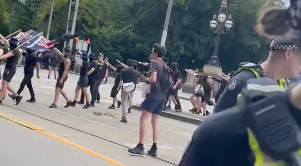 Neo-Nazis performing salutes at a Posie Parker event in Melbourne