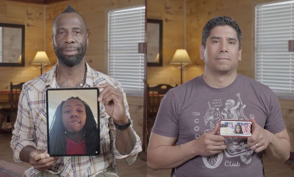 Stephen Chukumba and Frank Gonzalez hold up phots of their trans children in new film The Dads.