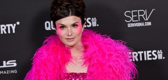 TikTok star Dylan Mulvaney wears bold pink look at Queries 2023 awards. (Getty)