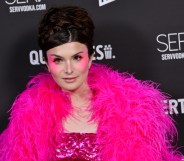 TikTok star Dylan Mulvaney wears bold pink look at Queries 2023 awards. (Getty)