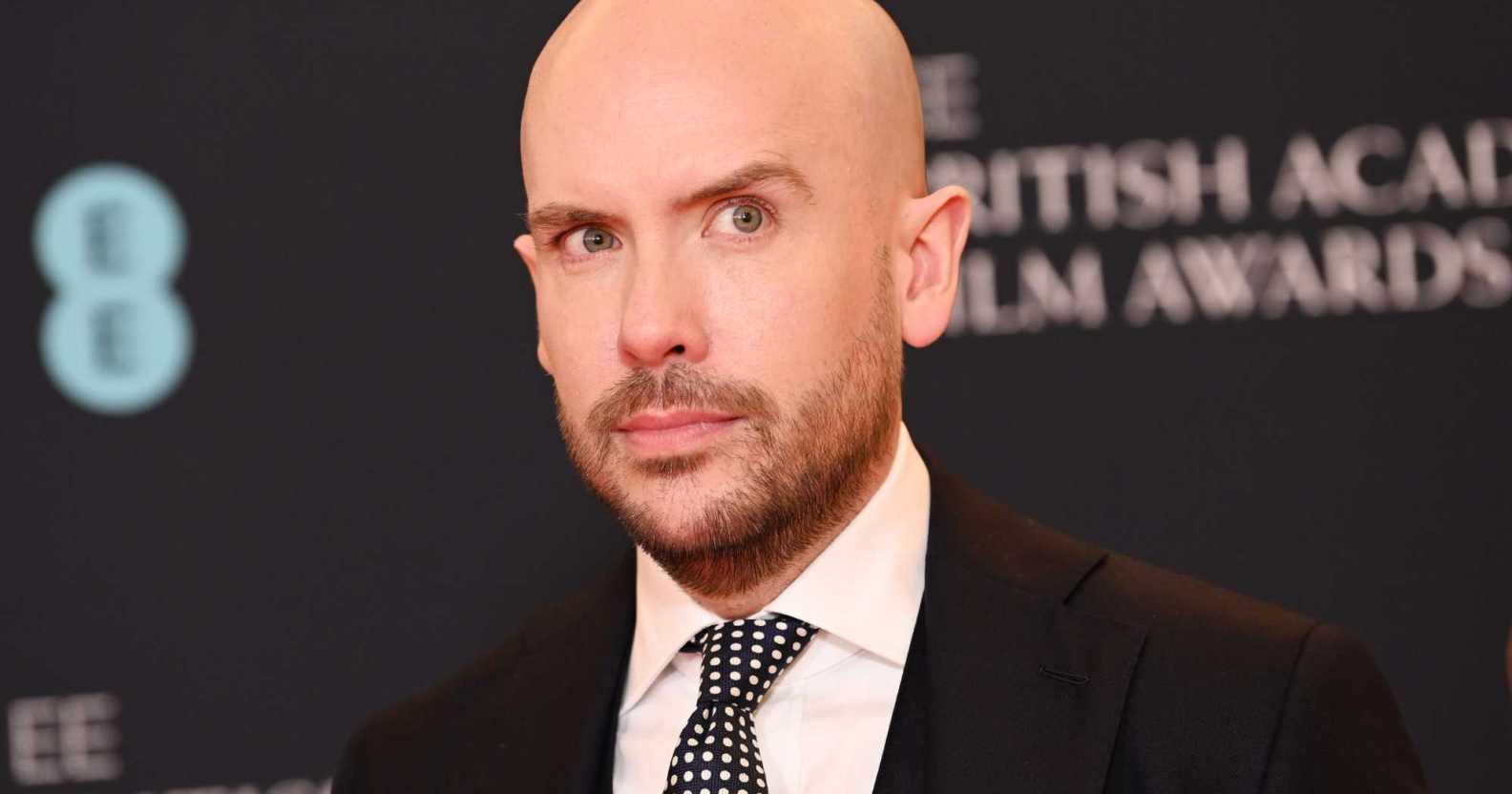Tom Allen pictured on the red carpet at an event.