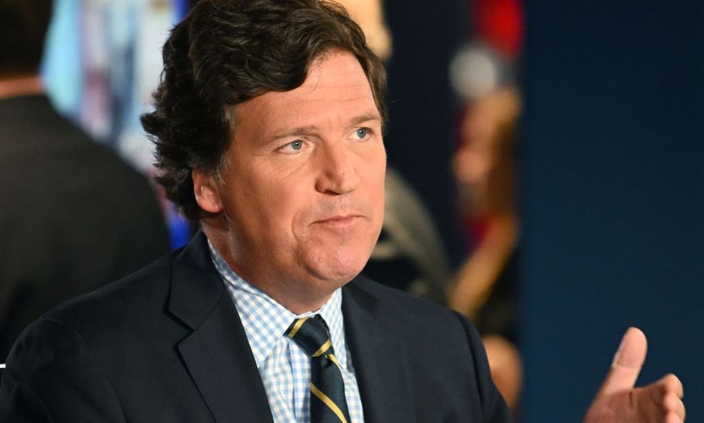 Tucker Carlson talking during a broadcast.