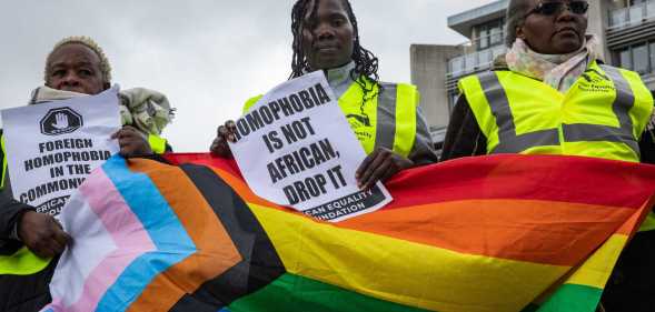 Ugandan LGBTQ+ people lead a protest in London.