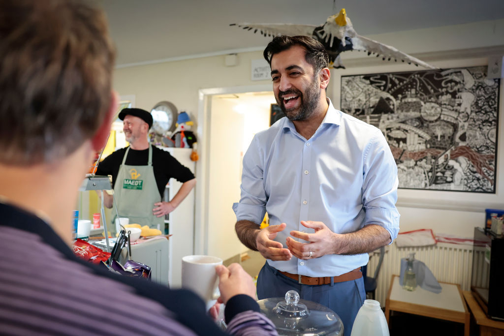 Humza Yousaf talks with members of the public.