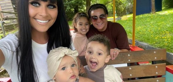 Laura-Rose Thorogood (L) and her wife Stacey pictured with three of their children.