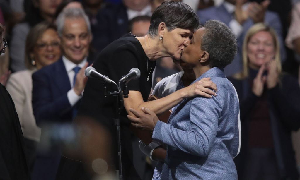 Lori Lightfoot congratulated by her wife Amy Eshleman with a kiss after being sworn in as mayor of Chicago, Illinois in 2019