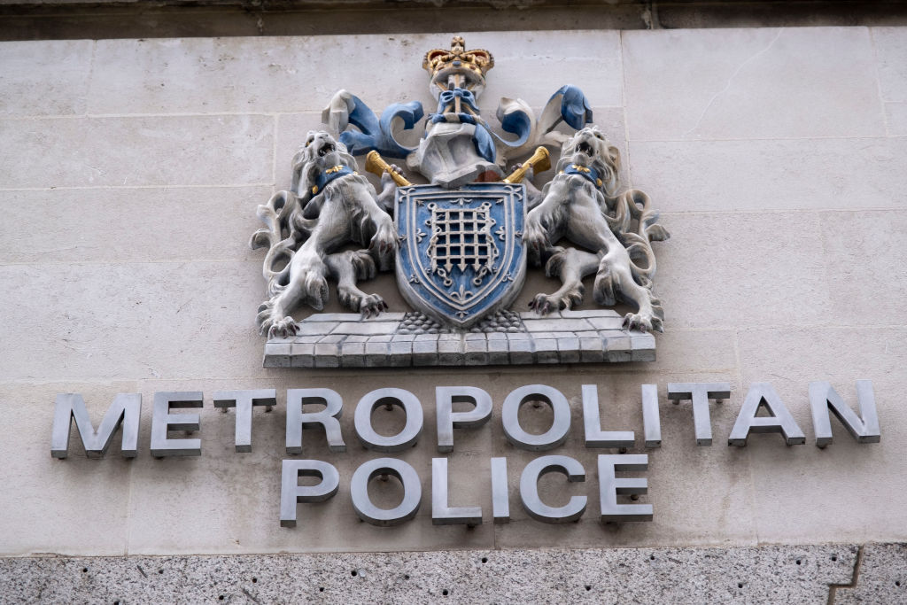 Sign and crest for the Metropolitan Police at their former Shoreditch Police Station on 6th March 2023.