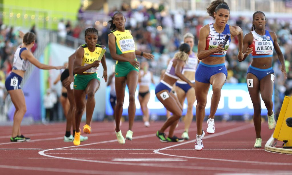 A group of women taking part in a World Athletics race.