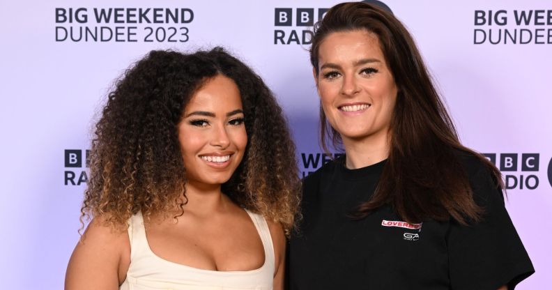 Love Island winner Amber Gill and Scottish footballer Jen Beattie pose for cameras at BBC Radio One Big Weekend.