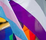 A trans and asexual flag waving together.