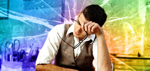 Collage showing a white male teacher looking upset, holding his head in his hands, with rainbow coloured shattered glass in the background
