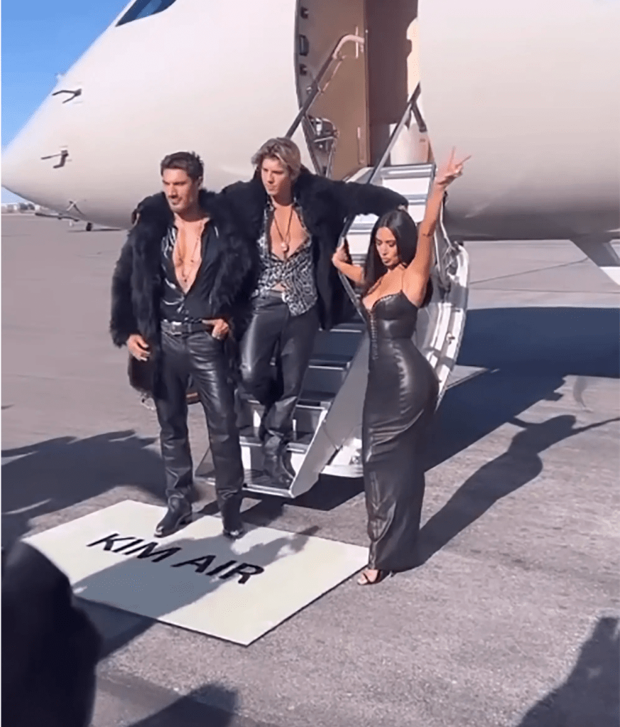 Chris Appleton (L), Lukas Gage and Kim Kardashian on her private jet.