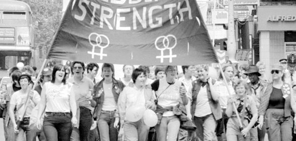 Lesbians march during a Pride parade.