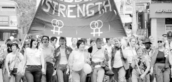 Lesbians march during a Pride parade.
