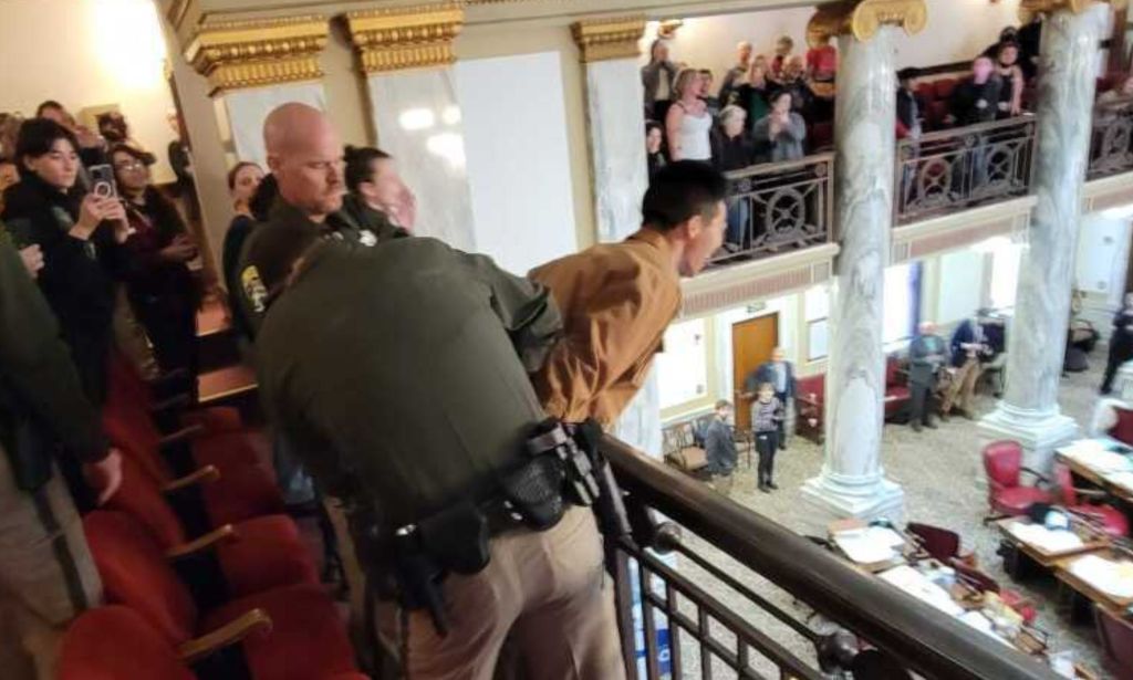 An individual being arrested by Montana police.