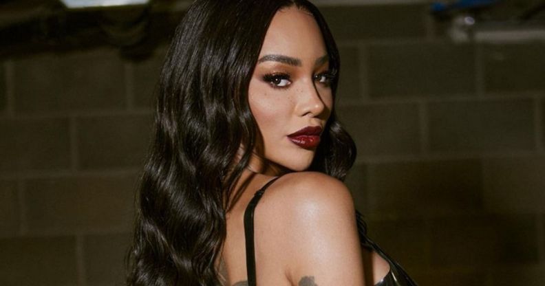 Munroe Bergdorf posing for a photo.