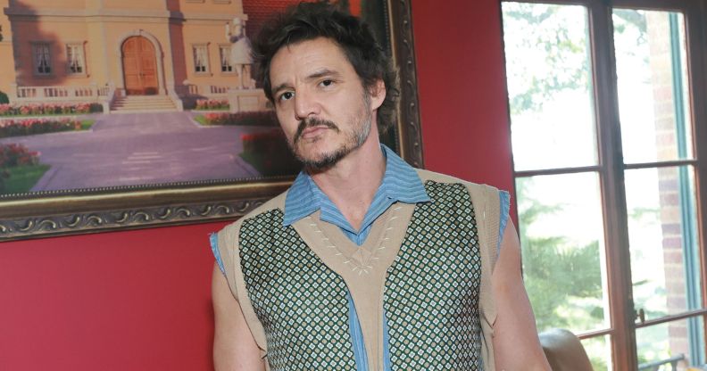 Pedro Pascal wears a spotted green, white and blue vest at the Merge Mansion Mobile Game Event.