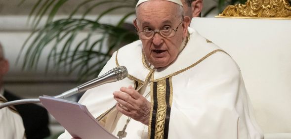 Pope Francis speaking at an event.