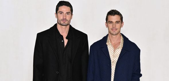 Queer Eye star Antoni Porowski stands with fiance Kevin Harrington at the 2023/2024 Paris Fashion Week.