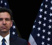 Ron DeSantis in front of United States flags