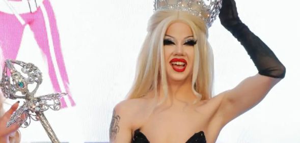 Drag Race seasonn 14 winner Willow Pill with her crown and sceptre.