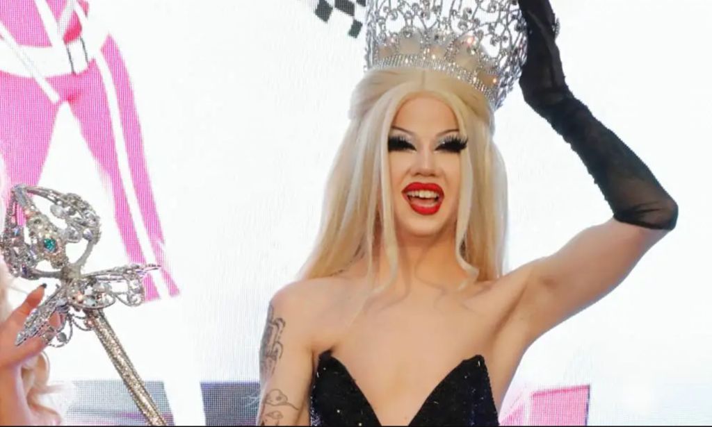 Drag Race seasonn 14 winner Willow Pill with her crown and sceptre.