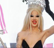 Drag Race seasonn 14 winner Willow Pill with her crown and sceptre.