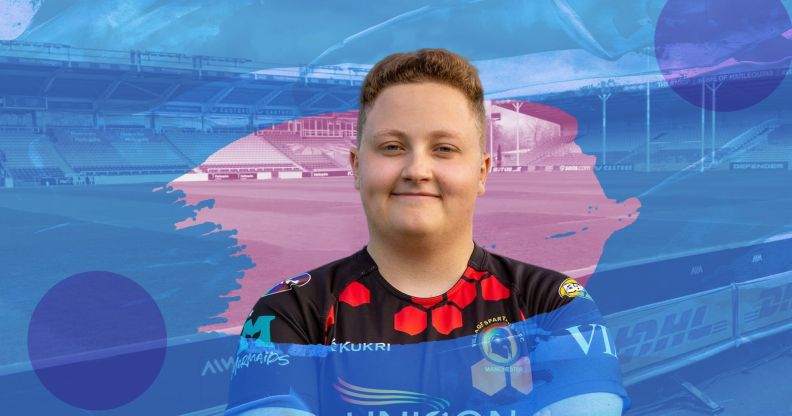 Trans man Emmett Peacock wears a rugby uniform with a rugby pitch in the background and blue and pink graphics on top