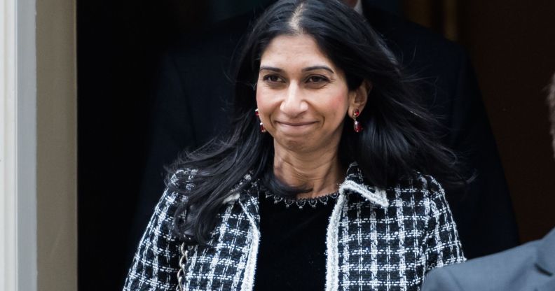 UK home secretary Suella Braverman wears a black and white patterned coat. LGBTQ+ and human rights campaigners have criticised Braverman for her comments about asylum seekers, including those from Sudan