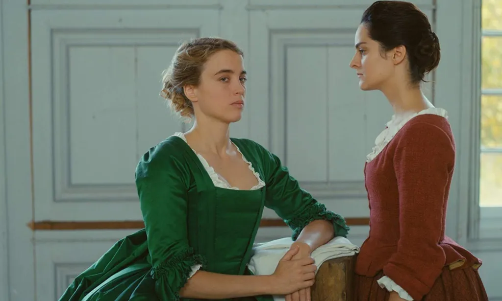 Adèle Haenel (L) in Portrait of a Lady on Fire. 