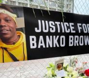 A banner above tributes to Banko Brown that reads "Justice for Banko Brown."