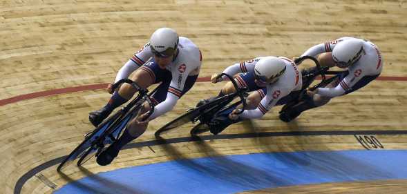 Great Britain team's members Lauren Bate, Blaine Ridge-Davis and Millicent Tanner compete in the women's Team Sprint qualifying during the UCI Track Cycling World Championships at Jean-Stablinski velodrome in Roubaix, northern France