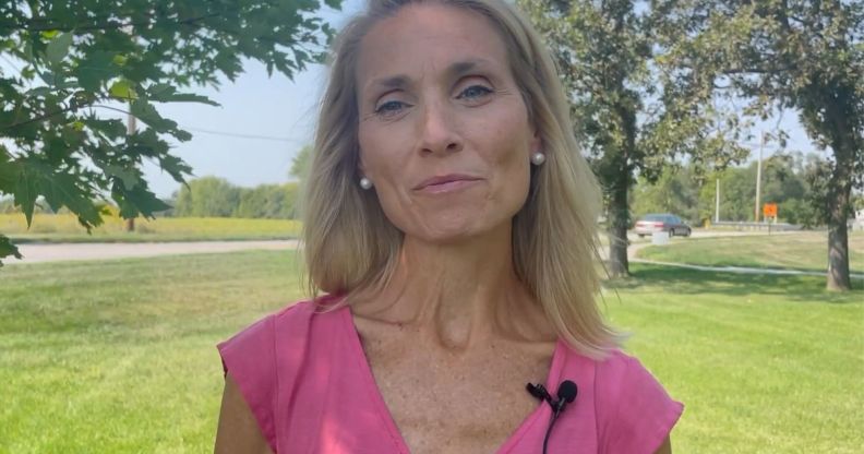 A photo of Republican senator Christy Armendariz outside by a Nebraska road.