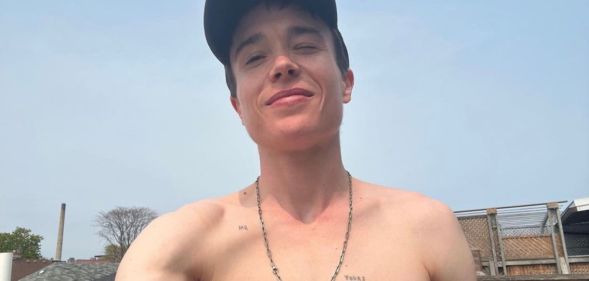 Elliot Page smiles in shirtless photo celebrating gender-affirming care.