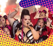Netta performs her song Toy with backing dancers, against a colourful background.