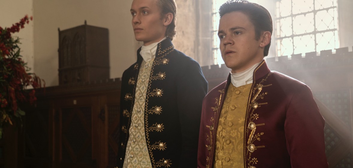 Gay couple Reynolds (Freddie Dennis) and Brimsley (Sam Clemmett) in Queen Charlotte: A Bridgerton Story.