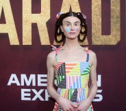 TikTok star Dylan Mulvaney wears a colourful dress with her hair in braids
