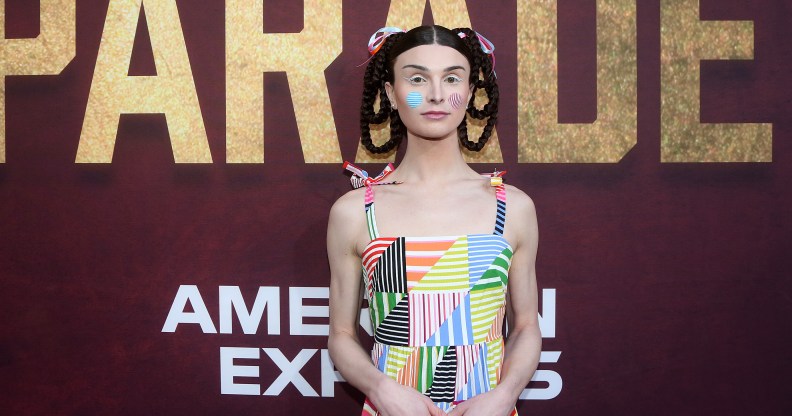 TikTok star Dylan Mulvaney wears a colourful dress with her hair in braids