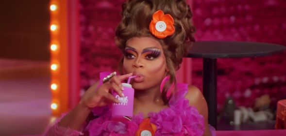 Heidi N Closet sips a drink in Untucked following the latest episode of RuPaul's Drag Race All Stars 8.