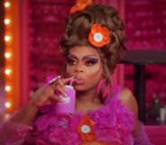 Heidi N Closet sips a drink in Untucked following the latest episode of RuPaul's Drag Race All Stars 8.