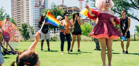 Texas drag queen Brigitte Bandit hosting a story time hour outdoors.